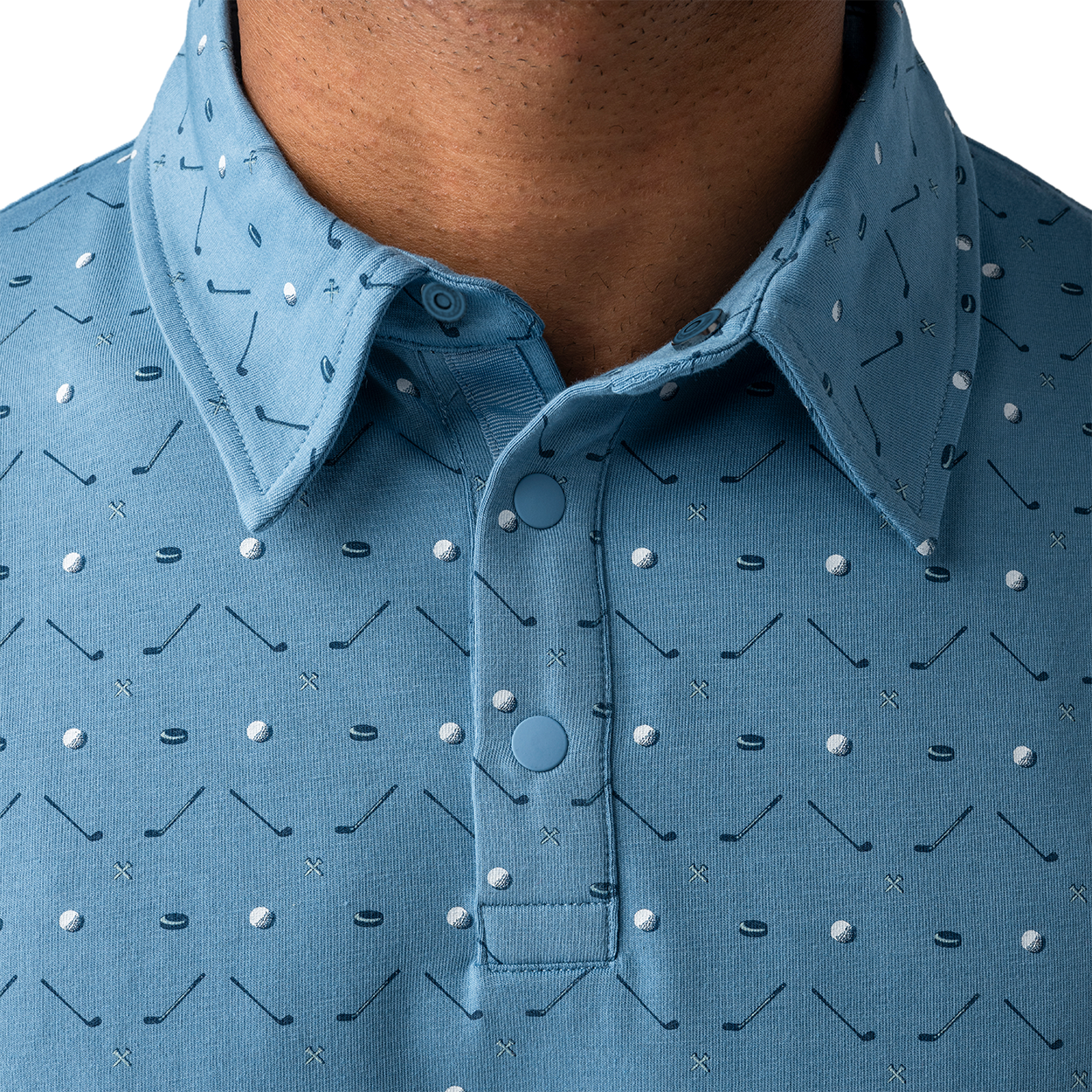 Close-up of a blue patterned polo shirt with a collar and buttons.